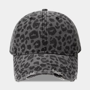 black cap featuring distressed and leopard