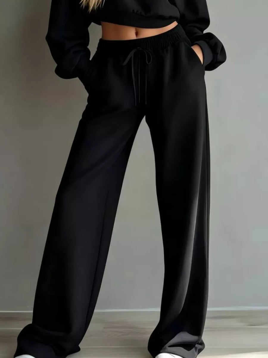 100% polyester Care instructions: Machine wash cold lounge set in Black with relaxed silhouette