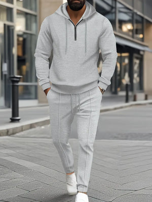 Textured gray quarter-zip hoodie and matching pants loungewear set with drawstring hood