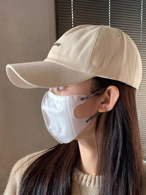 Beige cotton baseball cap with embroidered detail.
