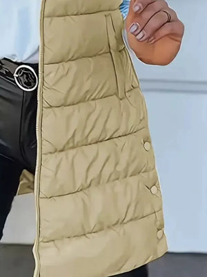 100% polyester Care instructions: Machine wash cold puffer vest in Tan with straight silhouette