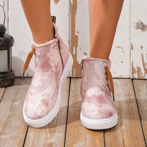 Blush pink tie-dye canvas zip-up sneaker booties with faux fur trim and laces.