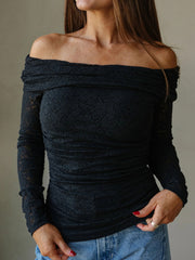 Black lace off-shoulder maternity overshirt with ruched detailing and long sleeves.