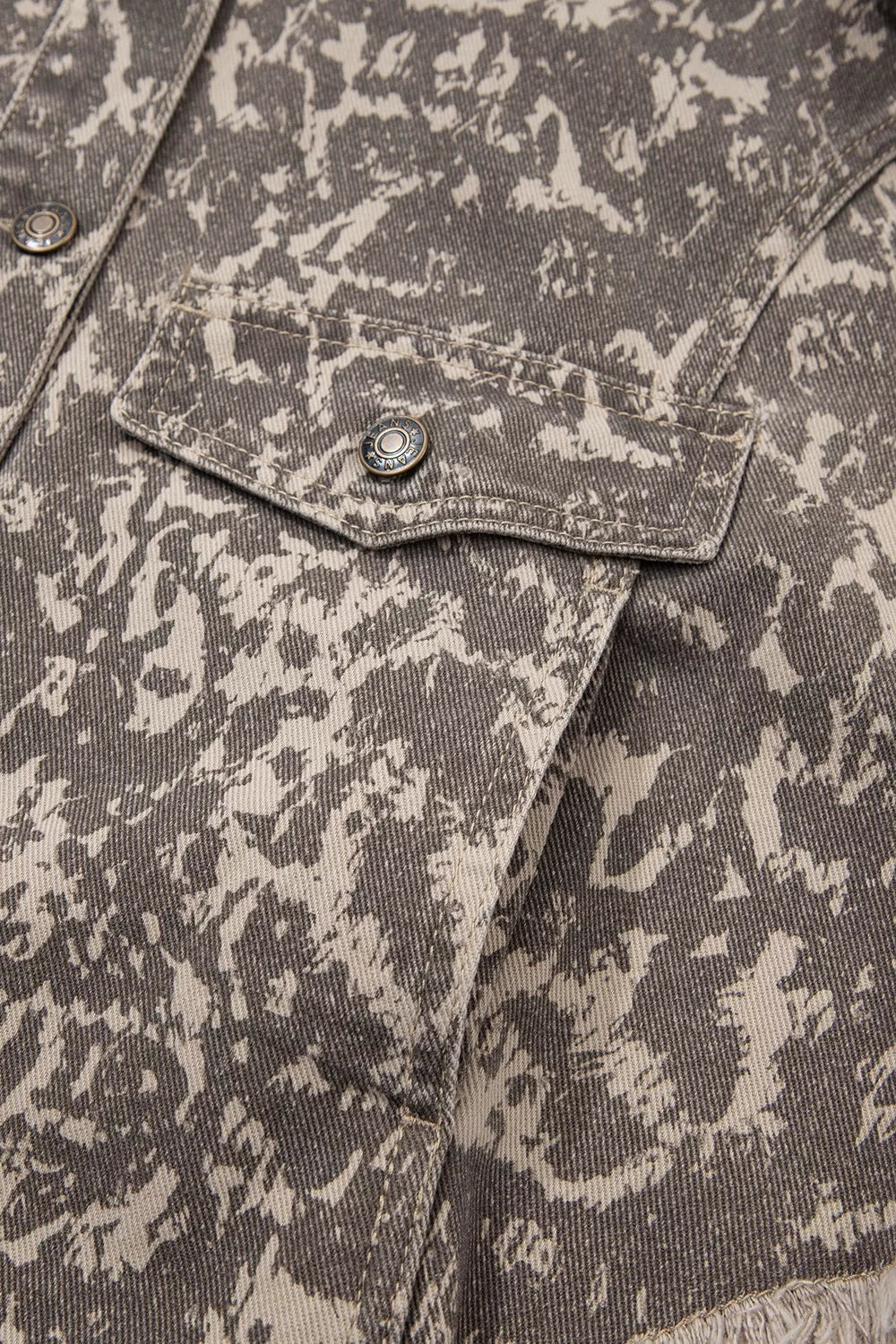 taupe denim jacket with button-front and camo