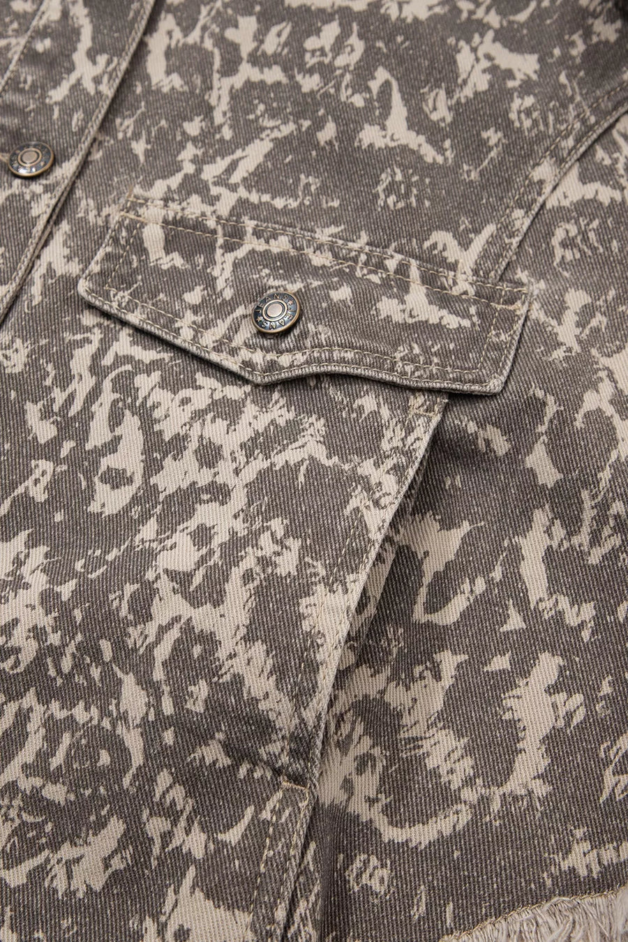 taupe denim jacket with button-front and camo