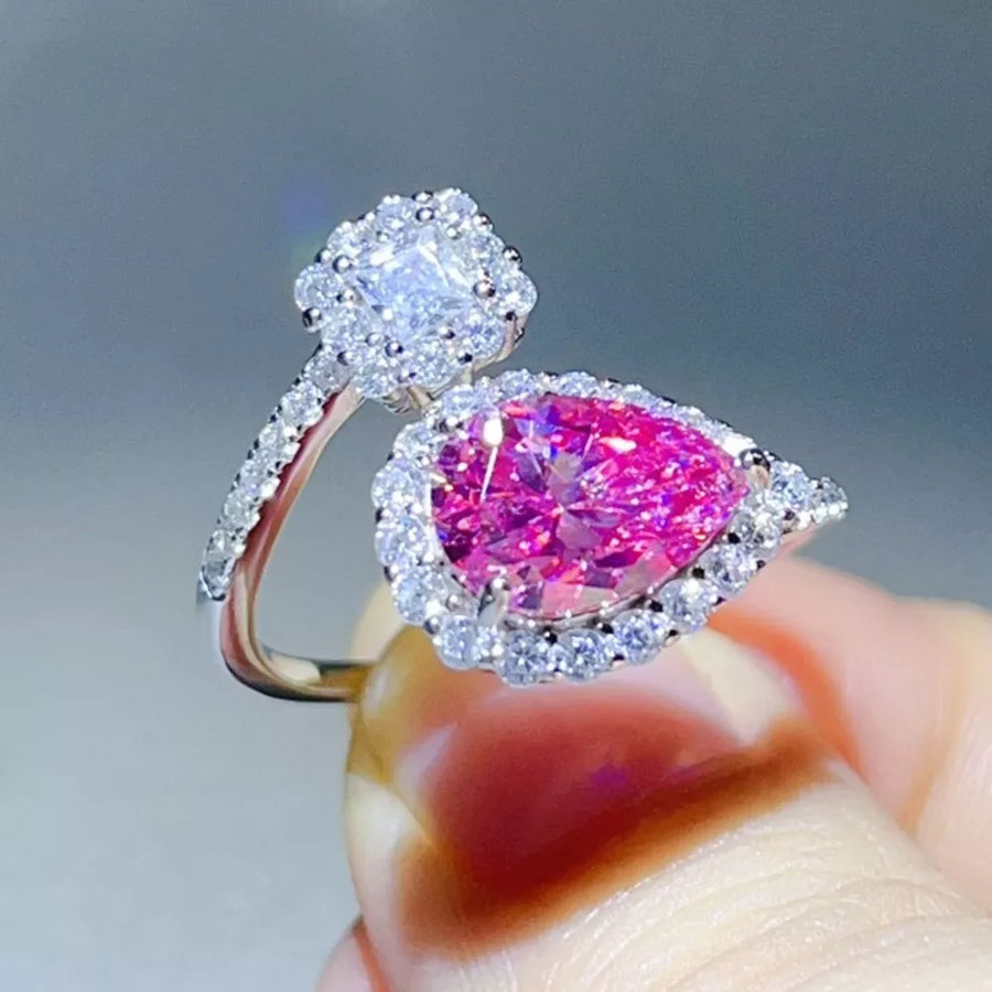 925 sterling silver,Moissanite Carat weight: 2ct Care instructions: Avoid wearin ring in Hot Pink with bypass silhouette