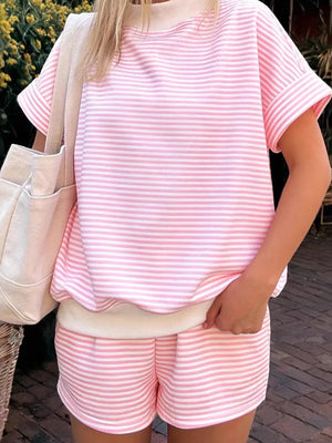 Pink and white striped loungewear set with a short sleeve top and matching shorts.