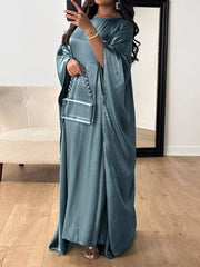 Deep teal kimono sleeve maxi dress with a flowy silhouette and elegant sheen.