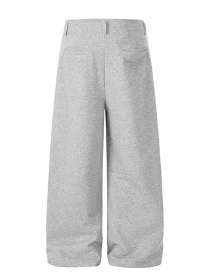 Men's gray wide-leg sweatpants with back pockets.