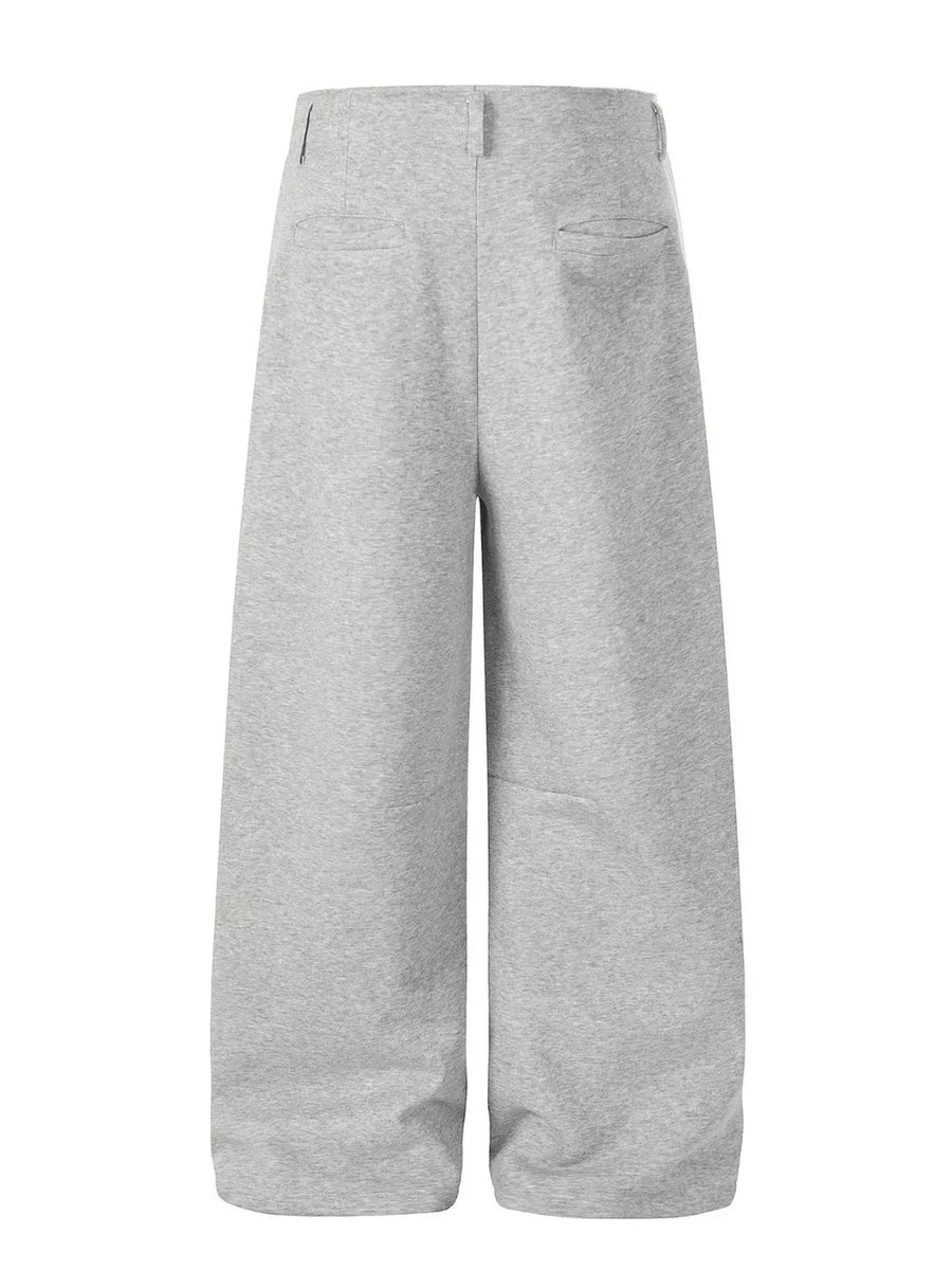 Men's gray wide-leg sweatpants with back pockets.