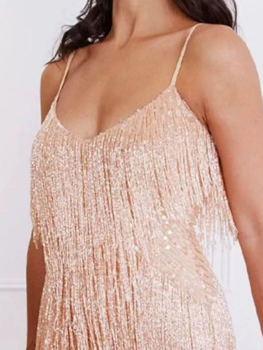 Rose gold sequin fringe slip dress with V-neckline and spaghetti straps.