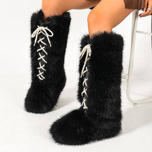 boots in black featuring faux fur and straight fit