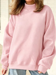 Mock Neck Dropped Shoulder Sweatshirt in Blush Pink with exposed seam