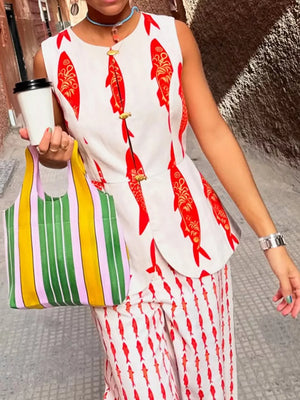 Red fish-print sleeveless top with button detail and matching pants.