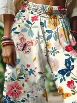 pink wide-leg pants featuring elastic waist and floral