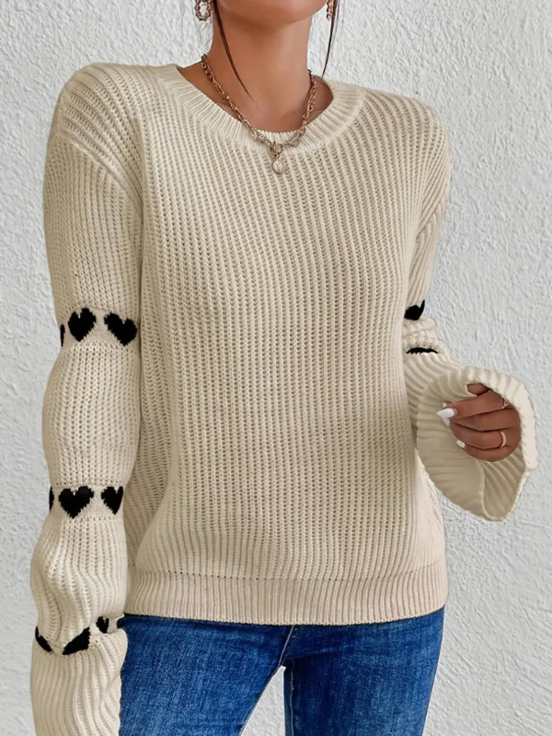 pullover sweater featuring heart in Red Apricot with 100% polyester Care instructions: Machine wash cold texture