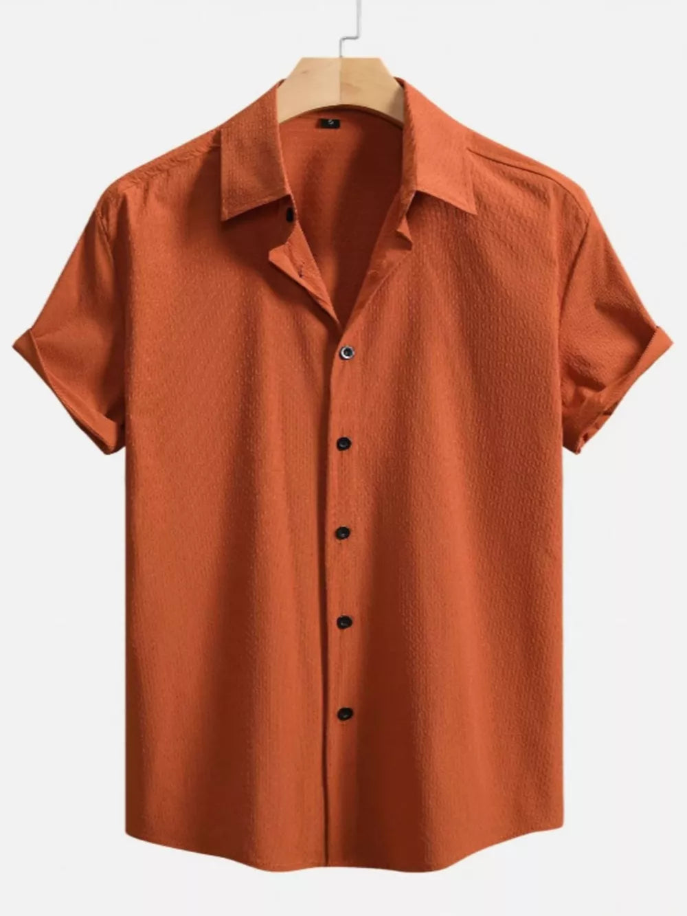 Orange textured Cuban collar casual shirt with short sleeves and button-down front.