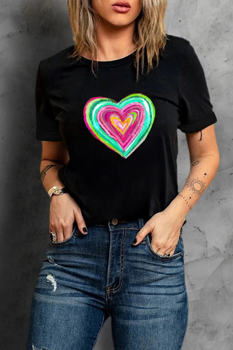 Black crew neck tee with a colorful painted heart graphic.