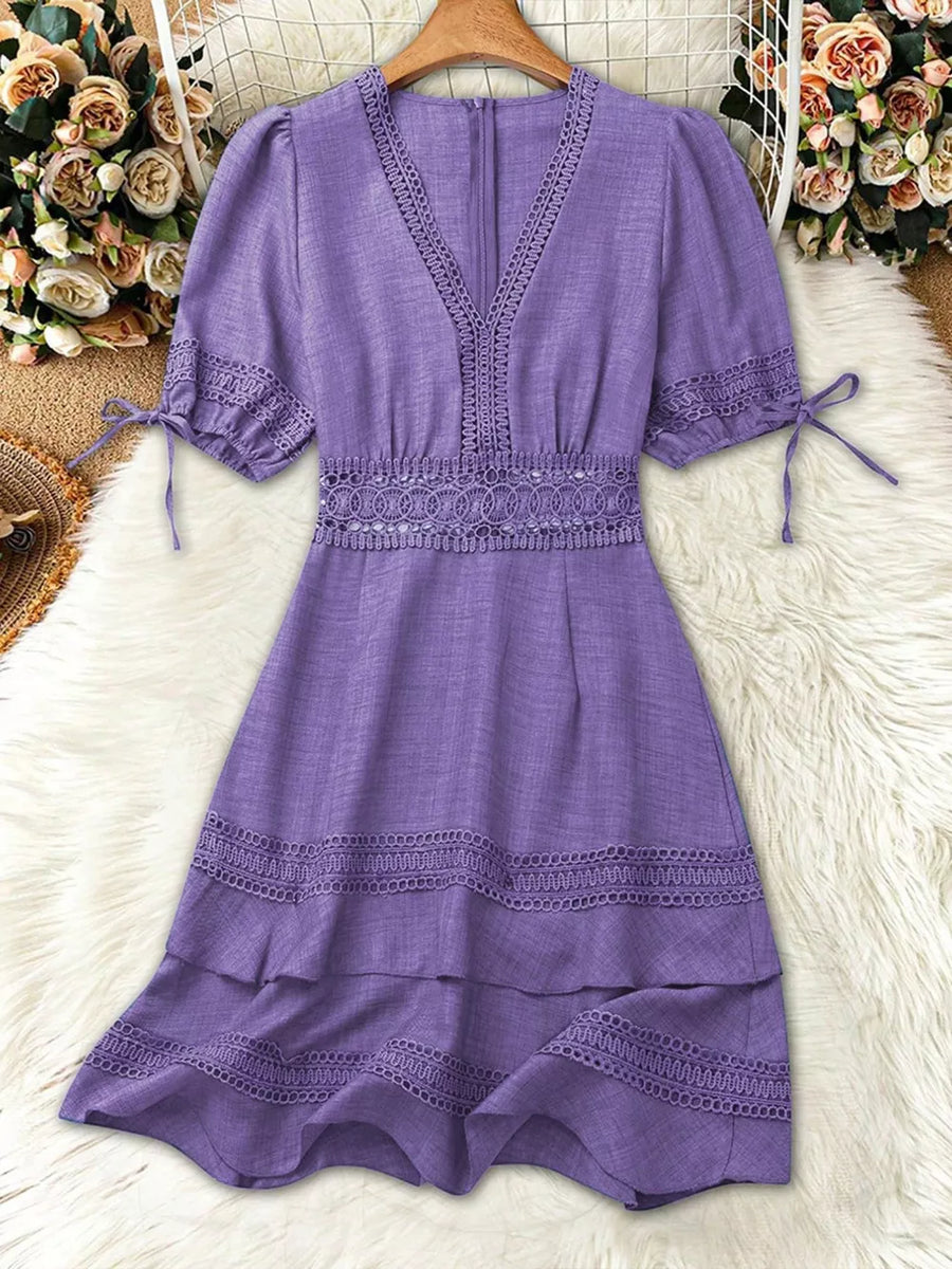 Purple lace-embellished V-neck mini dress with tie sleeves and tiered skirt.