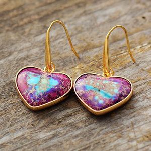 Heart-shaped jasper and gold earrings with purple and blue stone detail