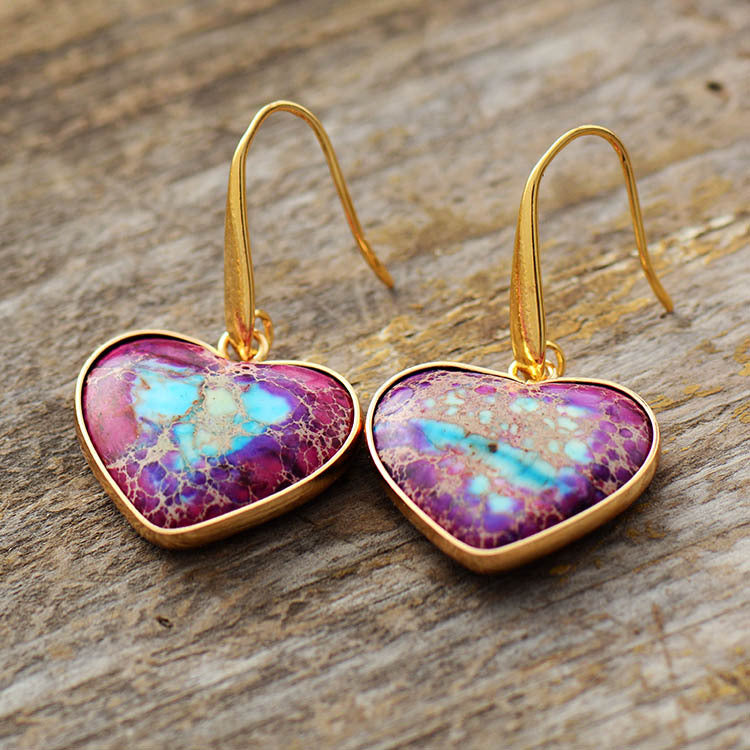 Heart-shaped jasper and gold earrings with purple and blue stone detail