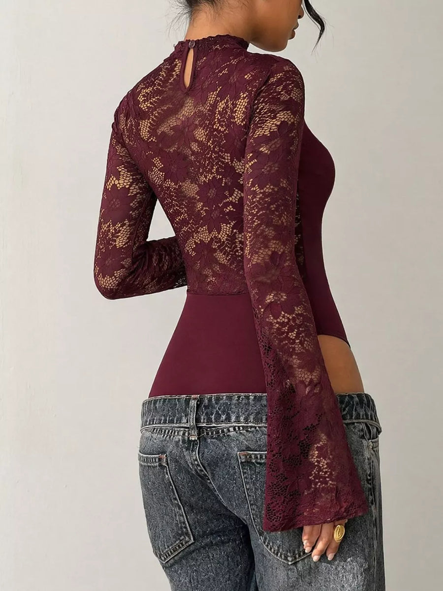 Burgundy lace bodysuit with mock neck, long bell sleeves, and a keyhole back detail.