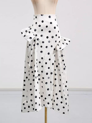 White polka dot maxi skirt with ruffled hip details