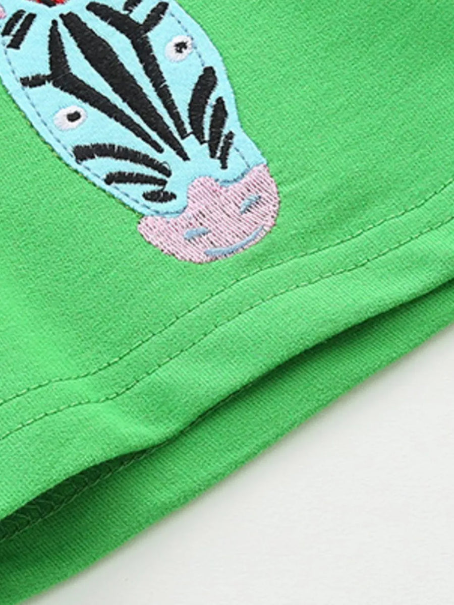Green cotton toddler tee with embroidered blue zebra face detail.