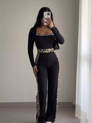 black jumpsuit with full-length and pullover