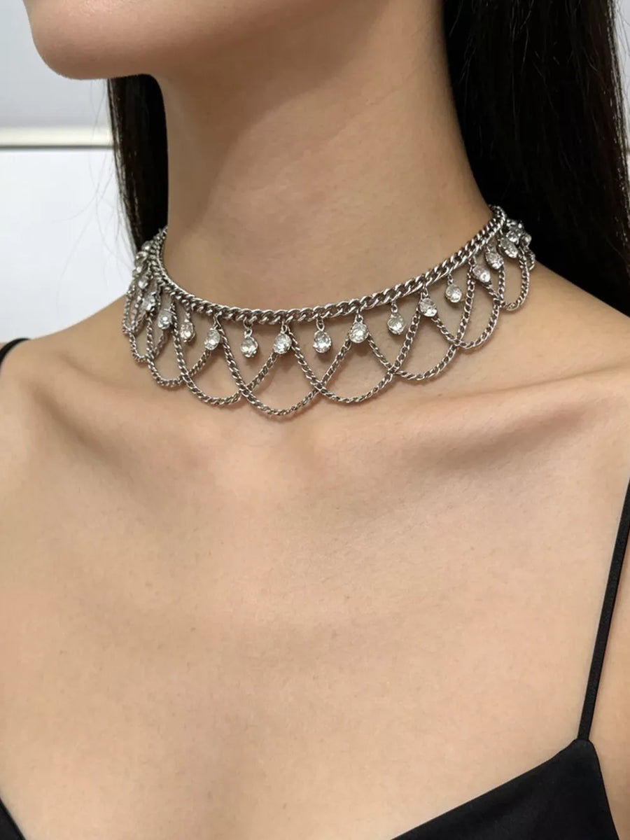 Gold necklace with zircon embellishments and n/a