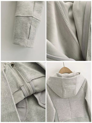 Black zip hoodie with seam detail and long sleeve
