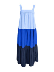 Three-tone wide strap maxi dress in blue, light blue, and navy with a tiered skirt.