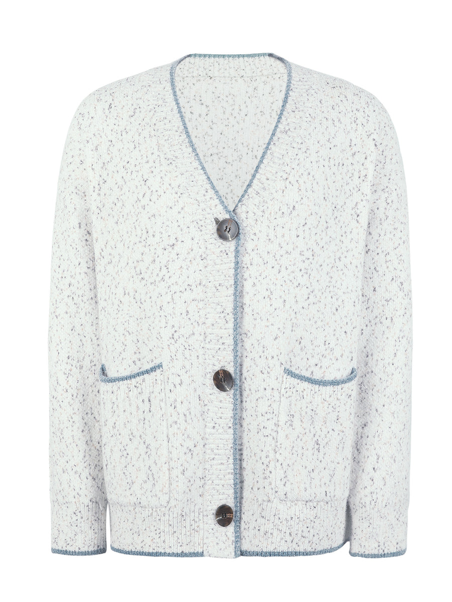 Textured knit cardigan in white with blue contrast trim and buttons.
