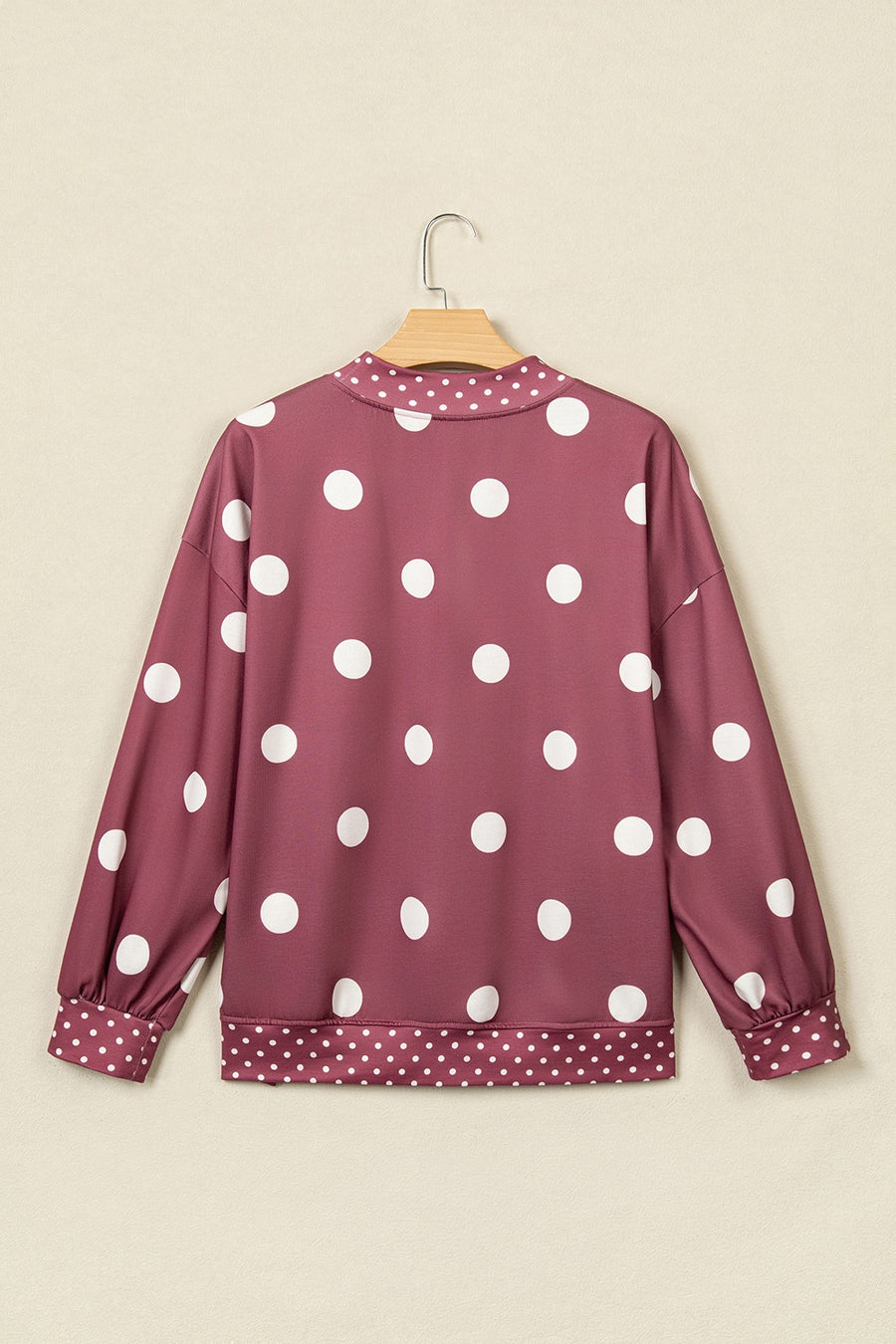 100% polyester Care instructions: Machine wash cold sweatshirt in Cerise with oversized silhouette