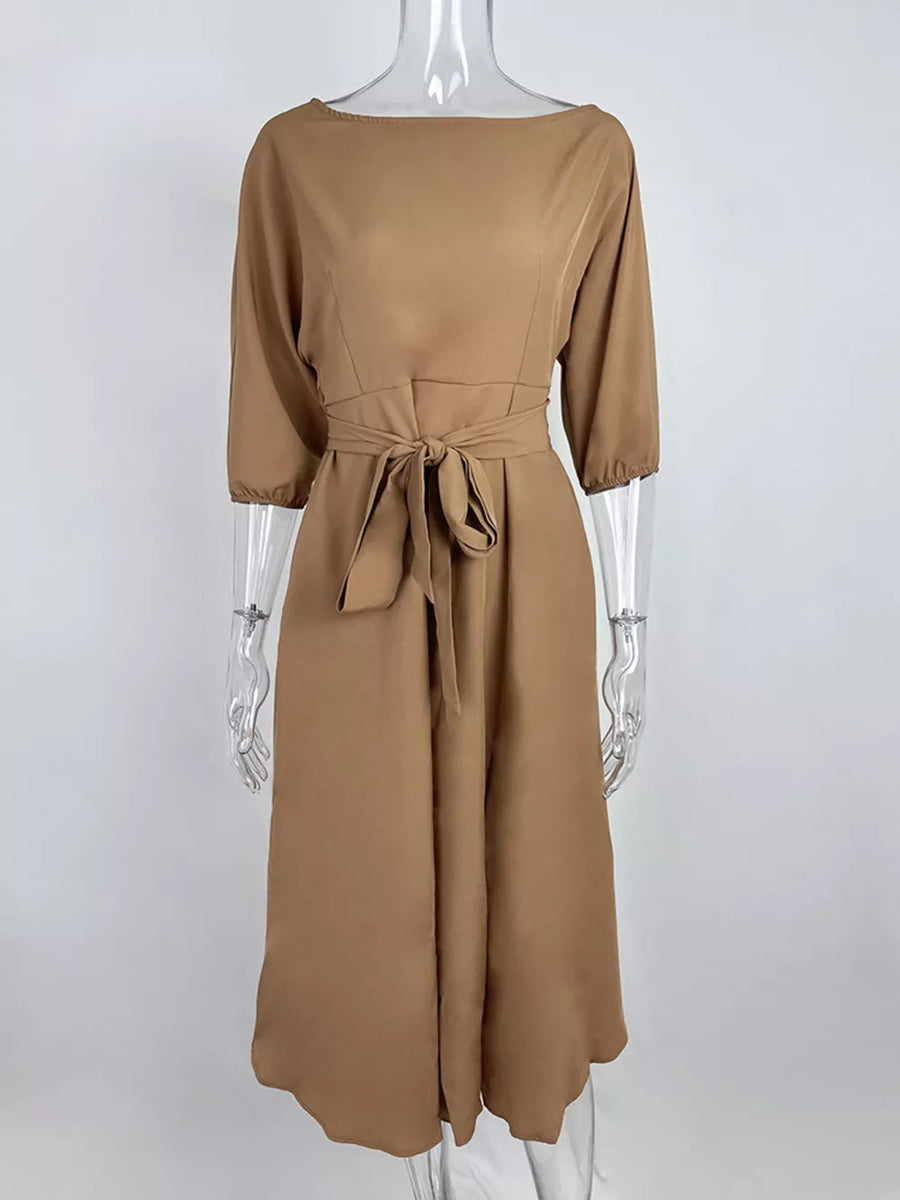 Camel off-the-shoulder belted midi dress with 3/4 sleeves and a tie waist.