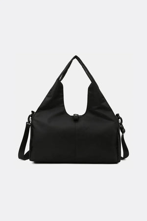 Black duffel bag with adjustable shoulder strap and top handles for weekend travel.