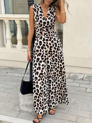 Chic sleeveless leopard print romper with V-neck and belted waist, wide leg pants.