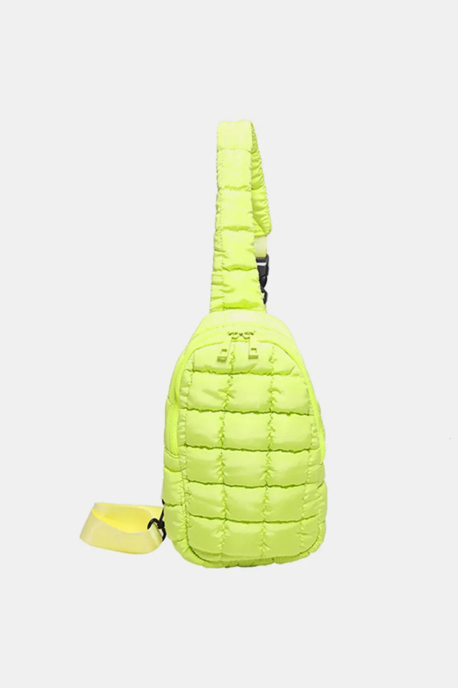 Padded sling bag in Yellow Green with quilted pattern and adjustable strap.