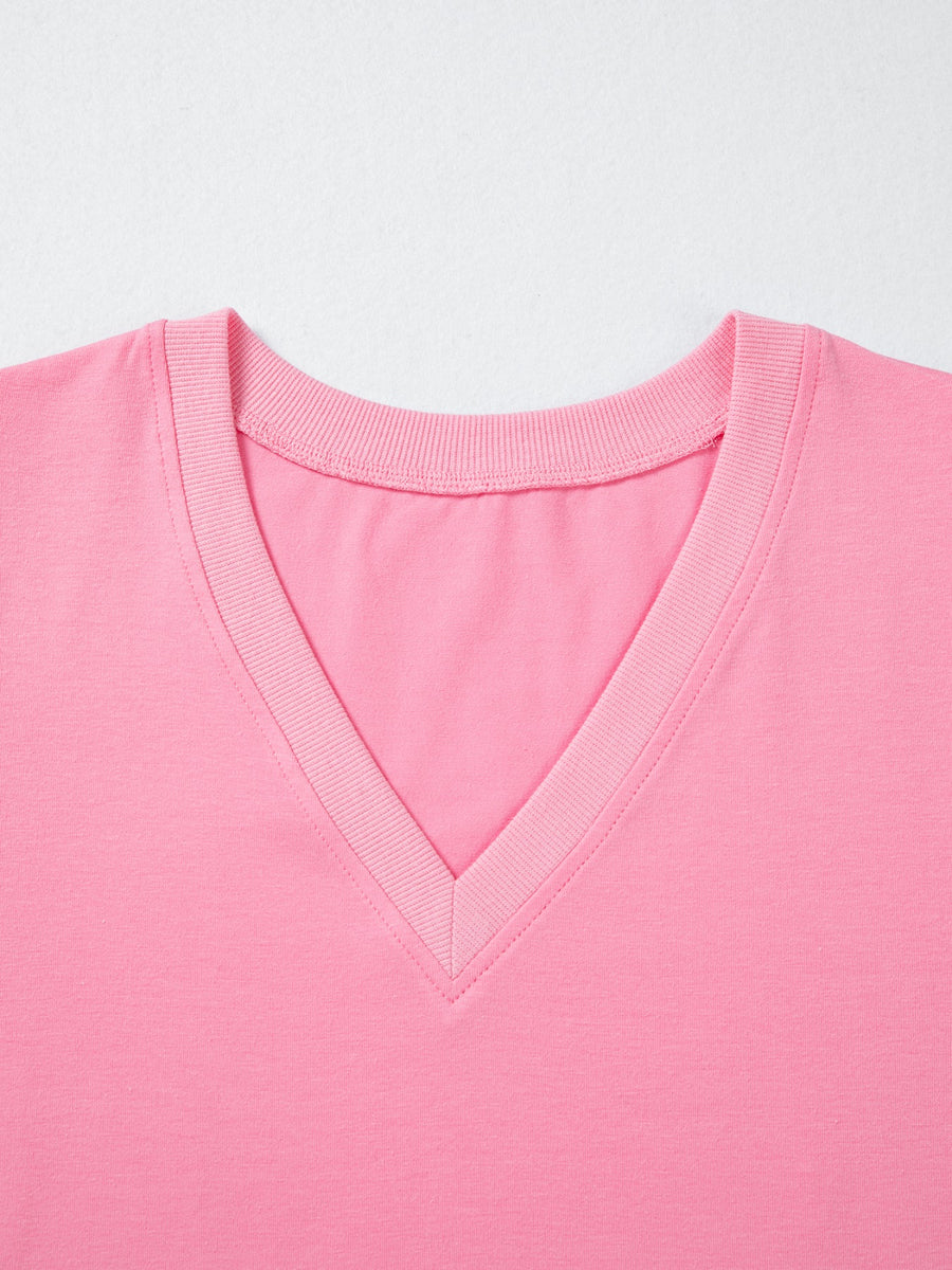 Pink cotton v-neck blouse with ribbed neckline detail