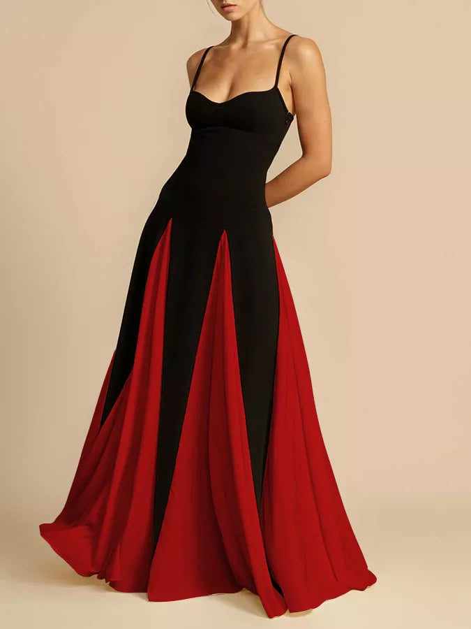 Elegant black and red maxi dress with spaghetti straps and a flowing skirt.