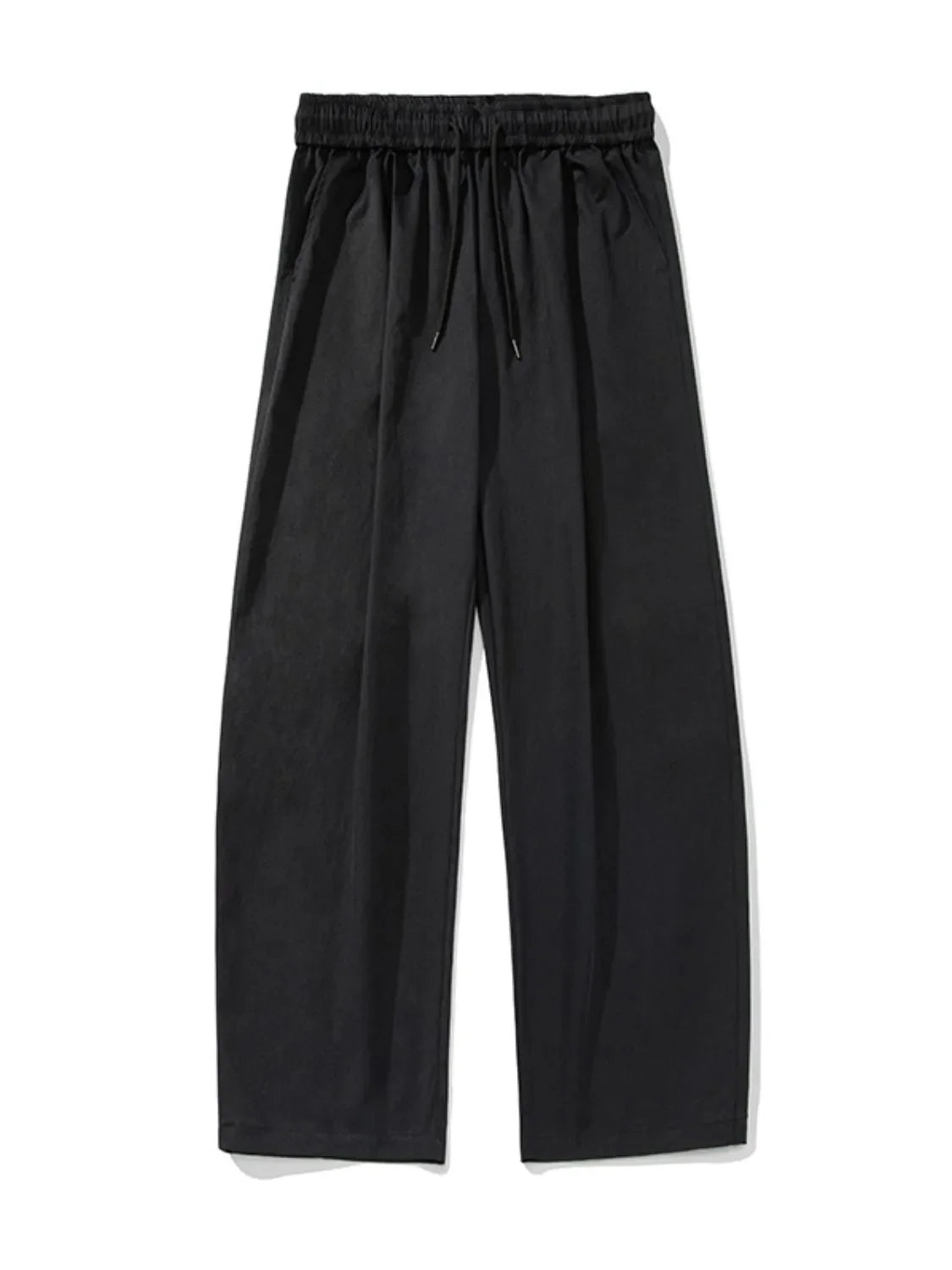 Black balloon-fit drawstring trousers with a relaxed casual style.