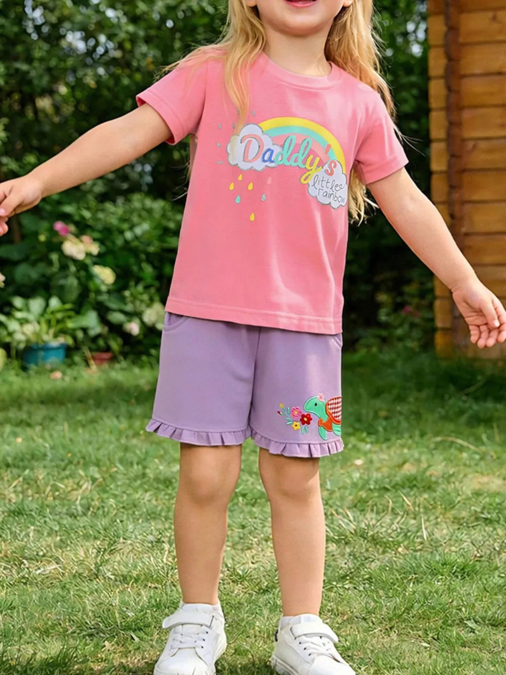Girls pink cotton tee with rainbow graphic and purple shorts with turtle embroidery