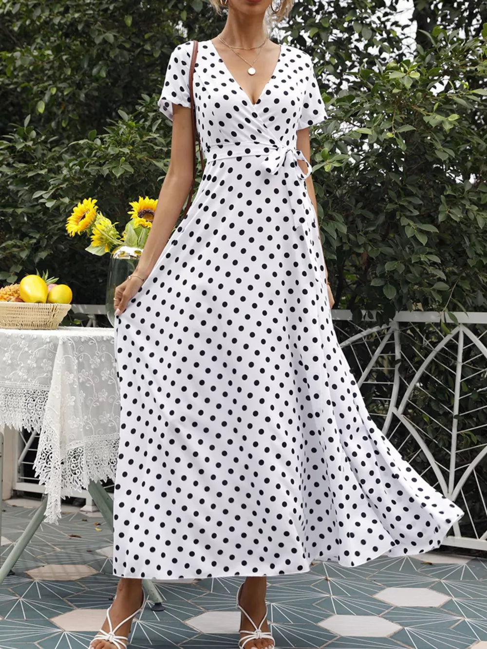 white wrap dress with polka dot and v-neck
