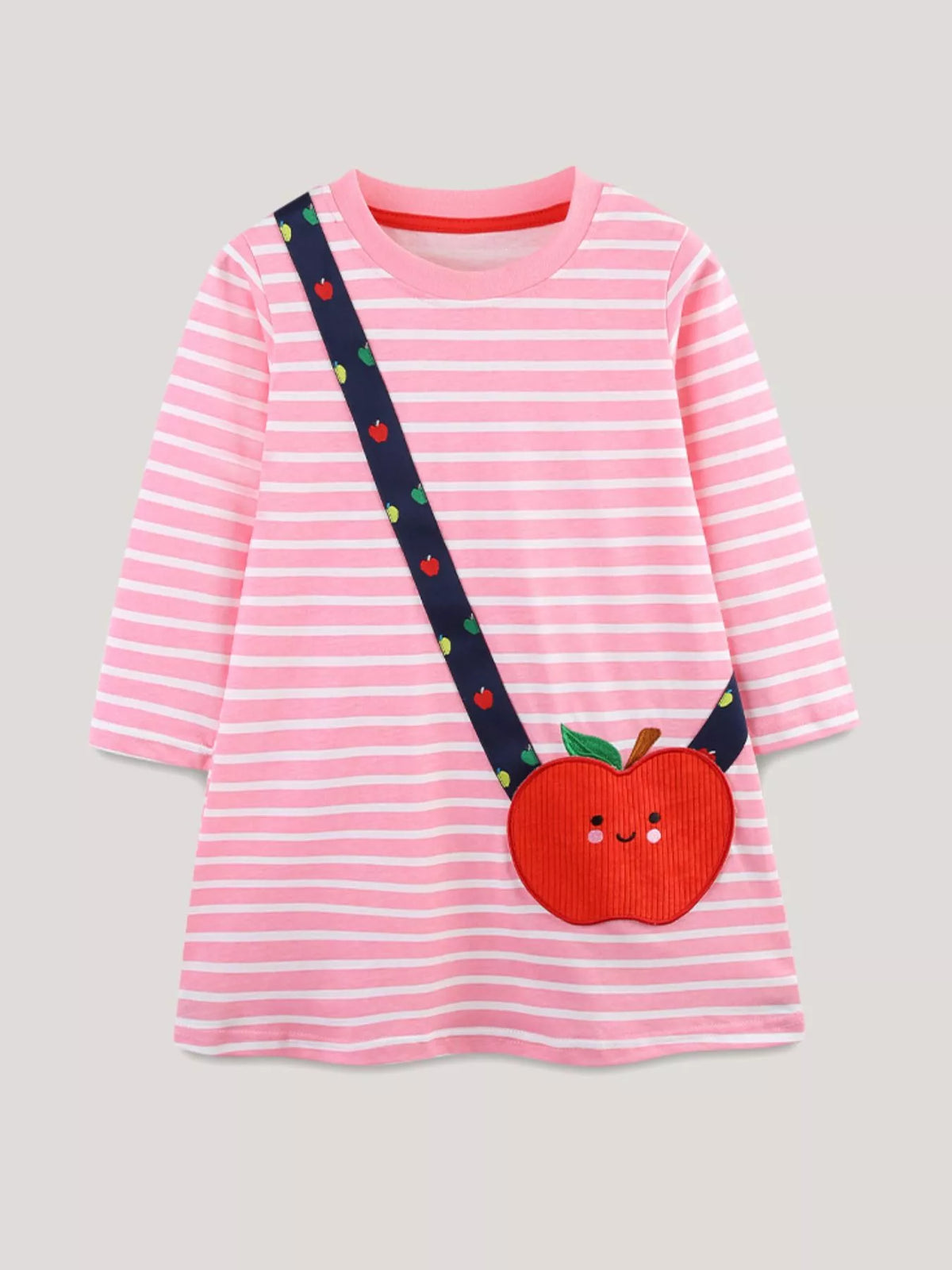 Pink striped cotton dress with a navy strap featuring apple appliques and a red corduroy apple purse detail.