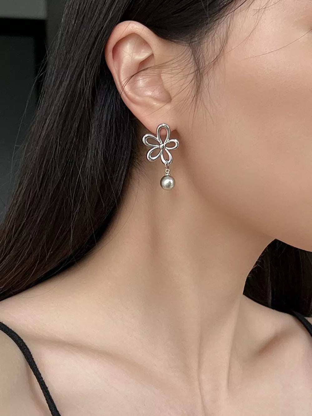 silver earrings with floral and null