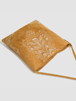 handbag featuring embroidered in Brown with Suede Imported Size &amp texture