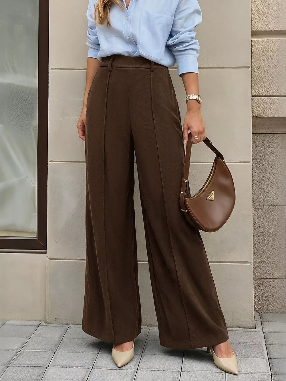 wide-leg pants in dark brown featuring pocketed and flared fit