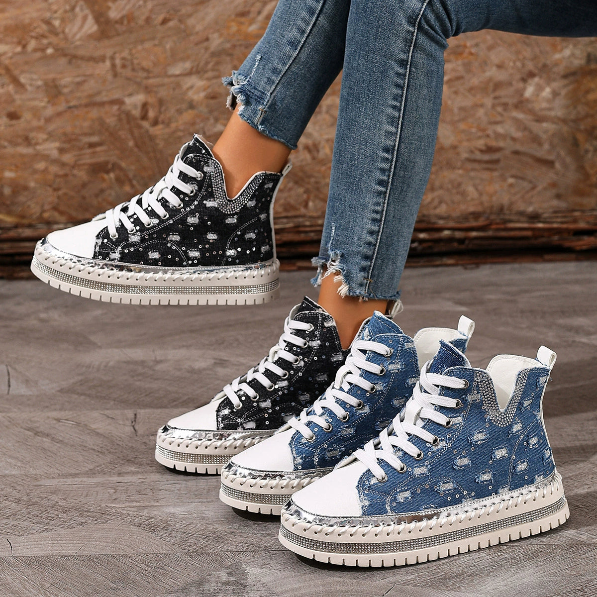 Rhinestone-embellished high-top sneakers in blue and black canvas with chunky soles.