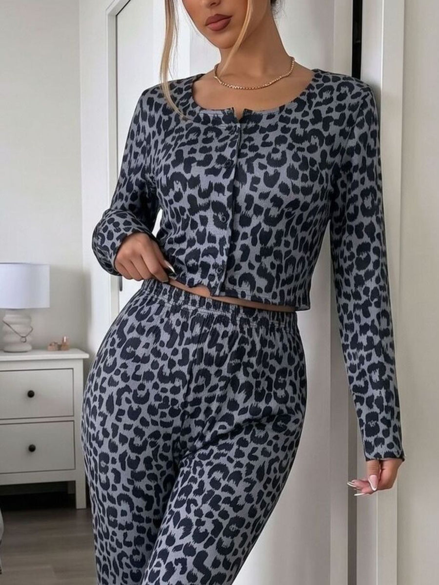 100% polyester Care instructions: Machine wash cold lounge set in Dark Gray with fitted top, flared pants silhouette