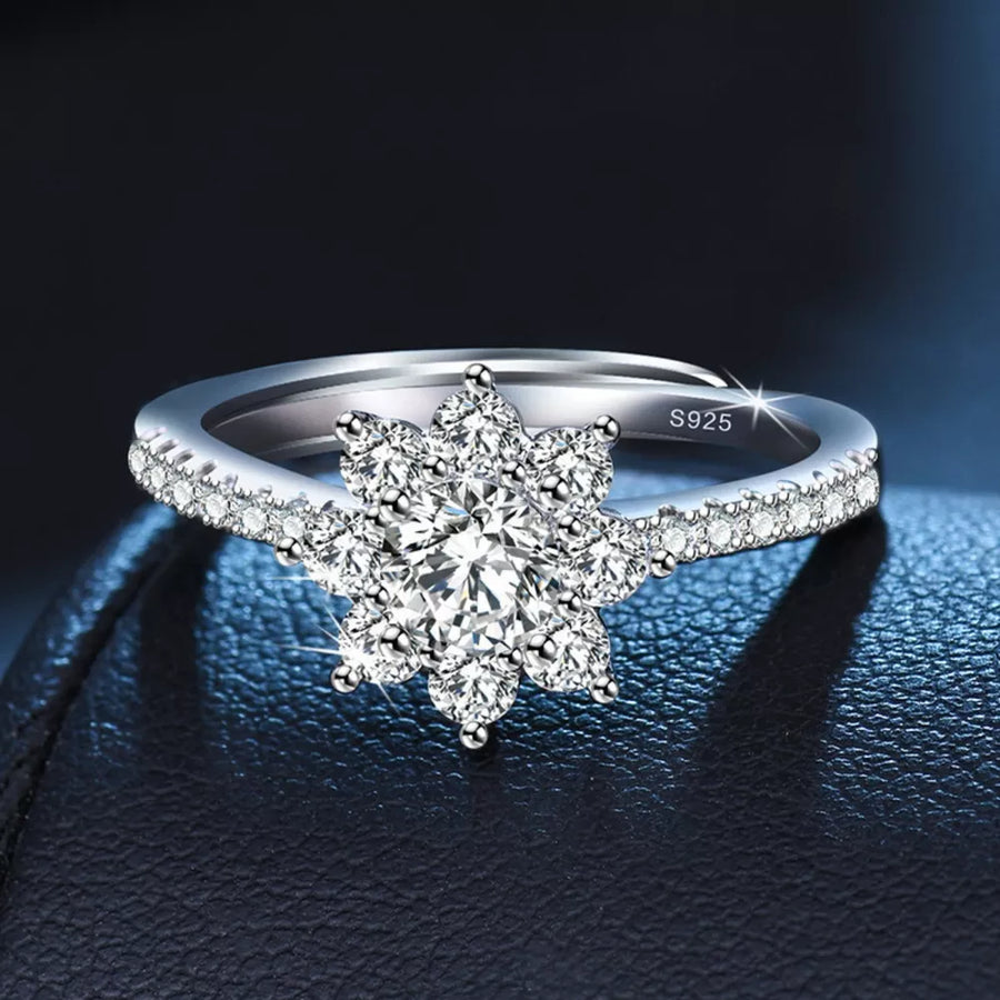 clear ring featuring adjustable and floral